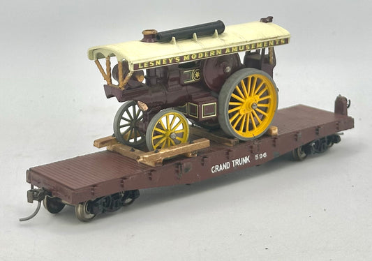 HO Scale Flat Bed car with Traction Engine Load (Lesney's Modern Amusements) All Metal .