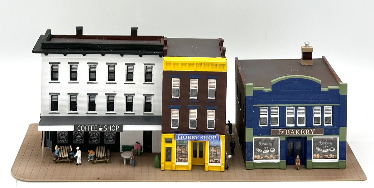 DPM N Scale Row of 3 Shops individually LED lighted, Custom-painted Street Figures