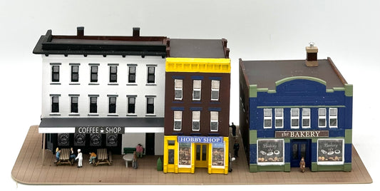 DPM N Scale Row of 3 Shops individually LED lighted, Custom-painted Street Figures