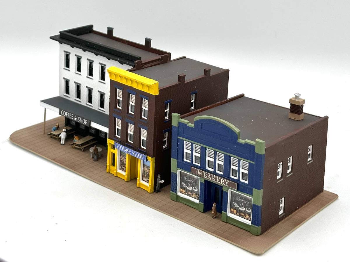 DPM N Scale Row of 3 Shops individually LED lighted, Custom-painted Street Figures